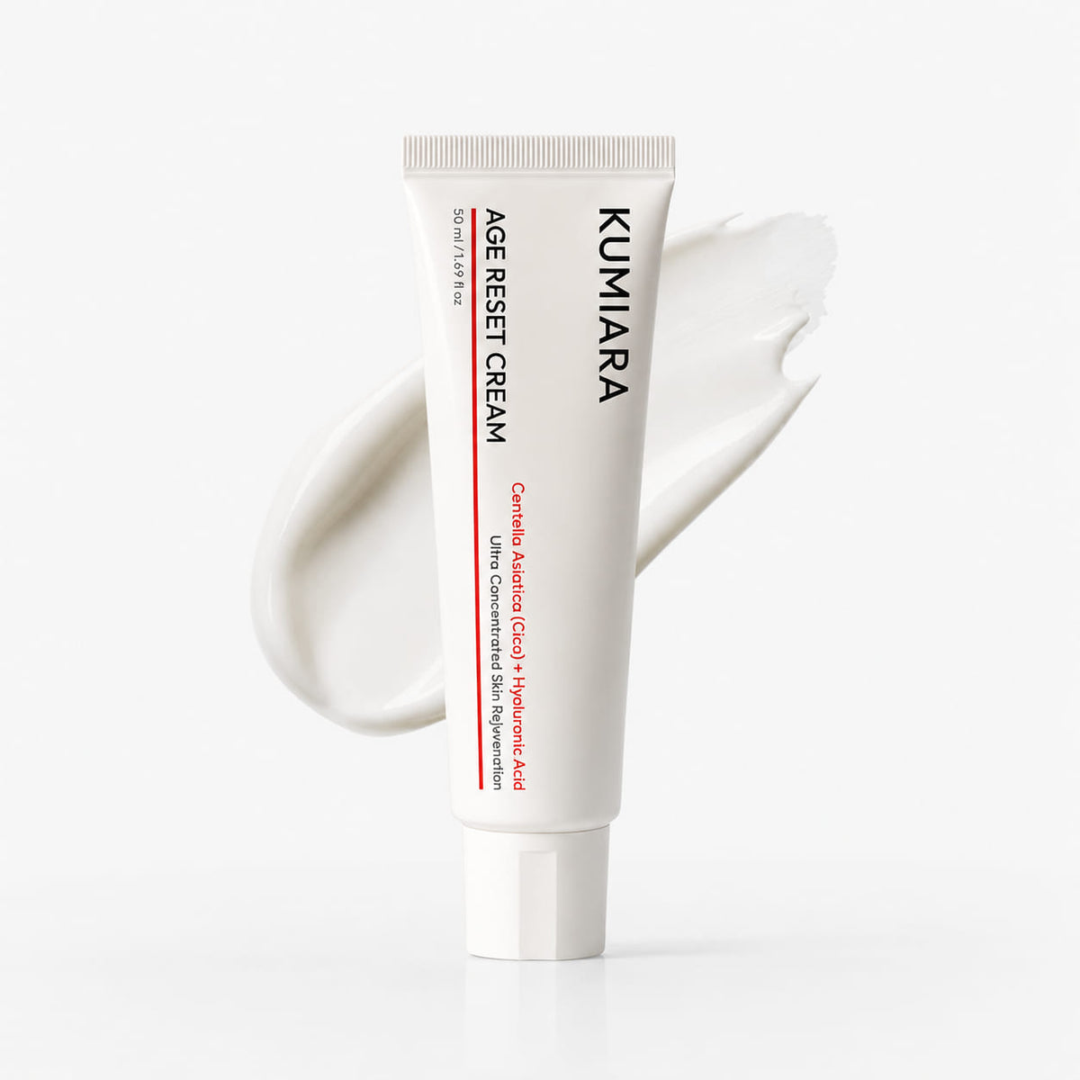 Tubetto Kumiara Age Reset accanto a foglie di centella asiatica
